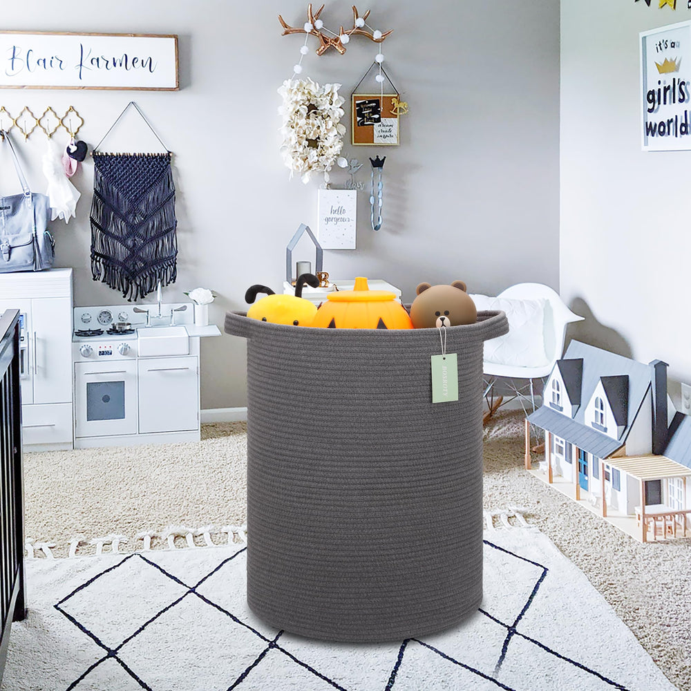 BOSROTY 72L basket stores blankets in a bedroom for easy reach