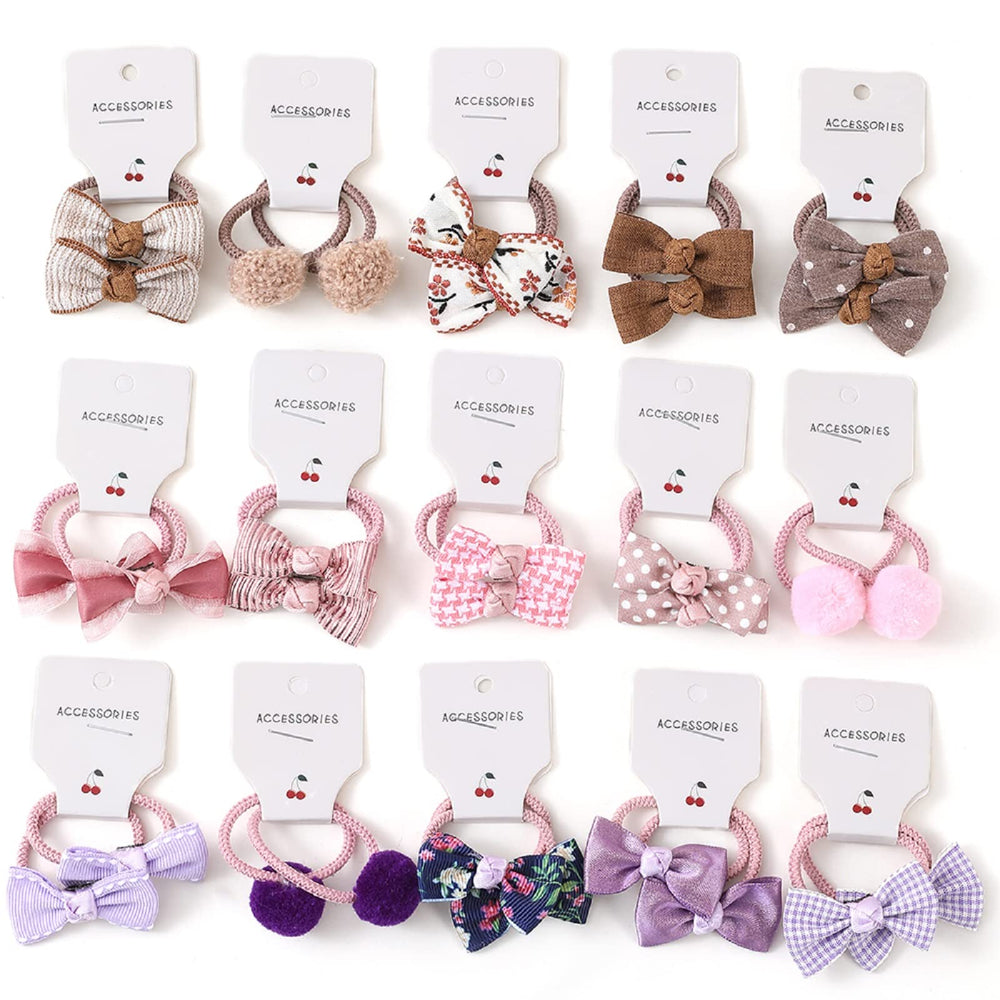 BOUNIQ baby hair ties with bows in assorted colors offering gentle hold for everyday outfits.