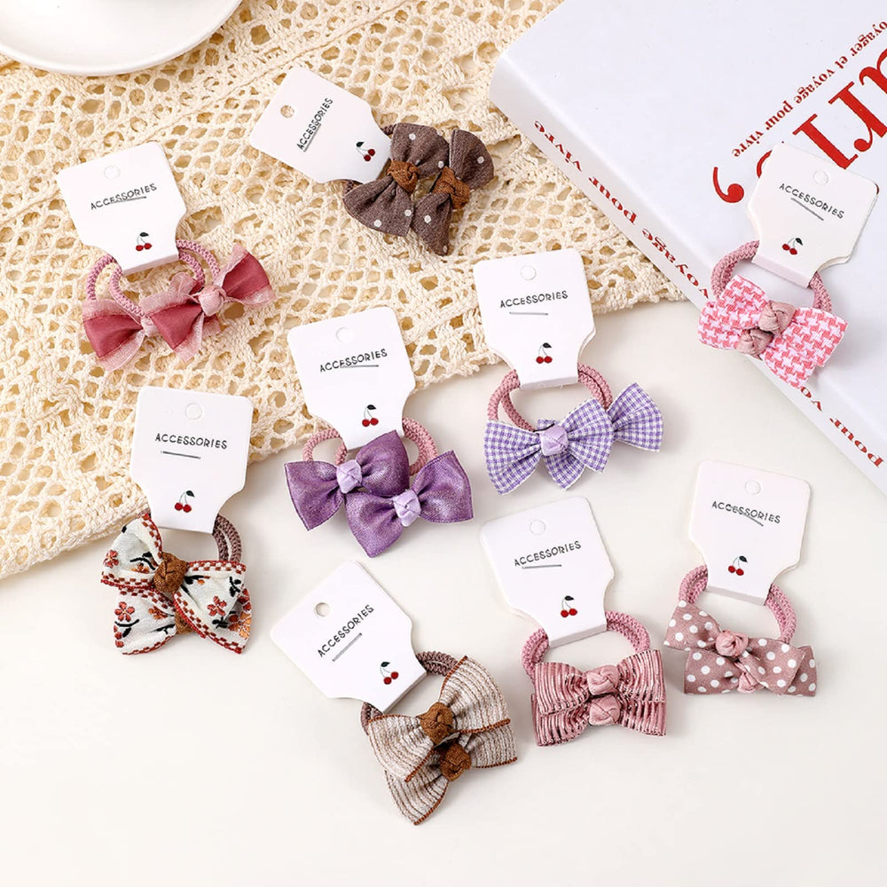 BOUNIQ classic chic hair ties with bows that add a refined touch to outfits.