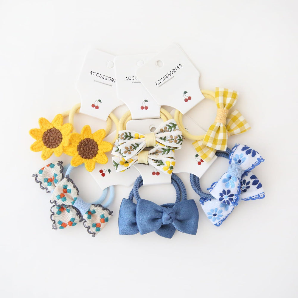 BOUNIQ varied colors bows hair ties show range for daily styling.