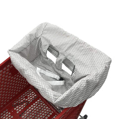 Brain Architect Child gray chevron high chair cover secured with belt for safe feeding.
