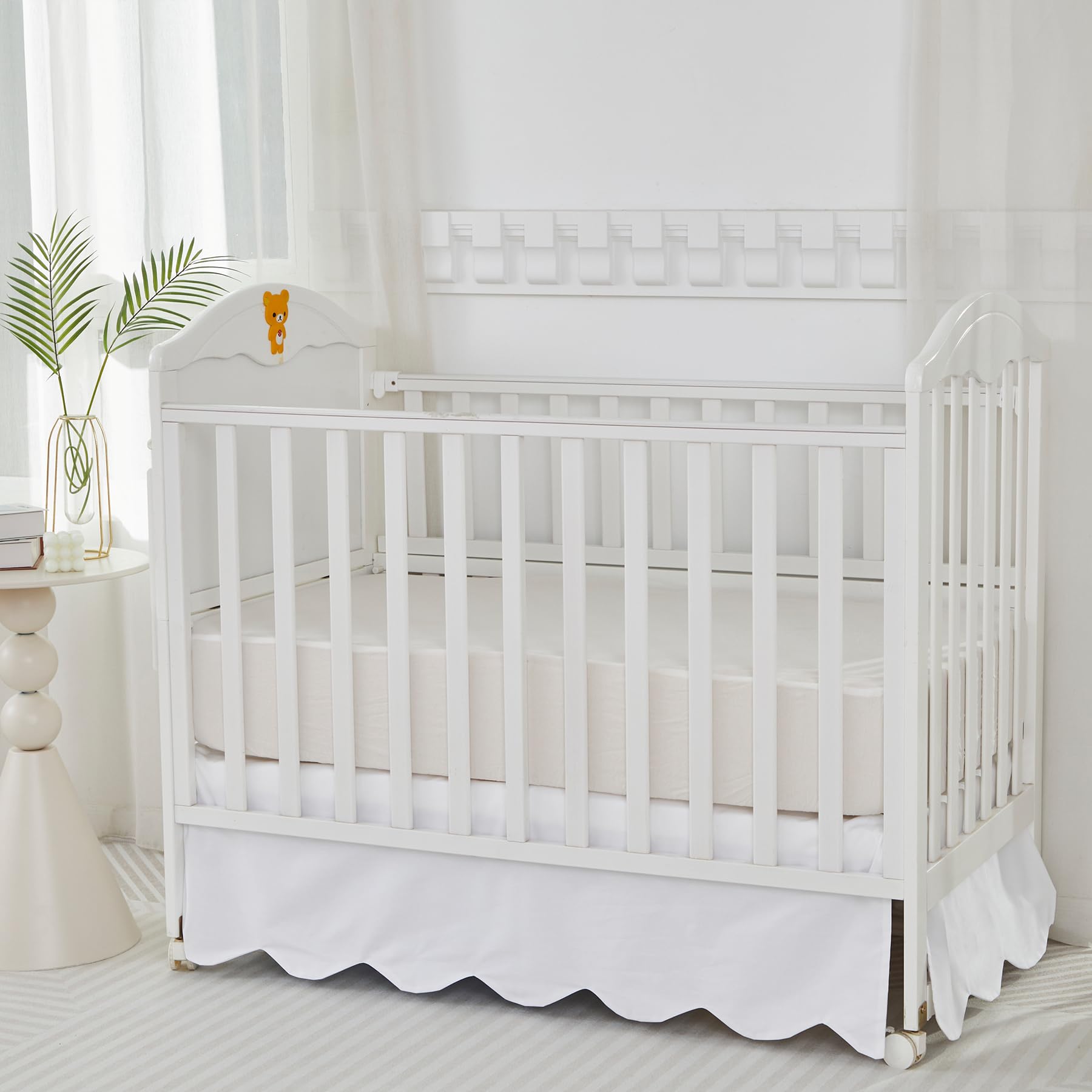 Brandream 4-sided crib skirt styled in cozy bedroom setup.