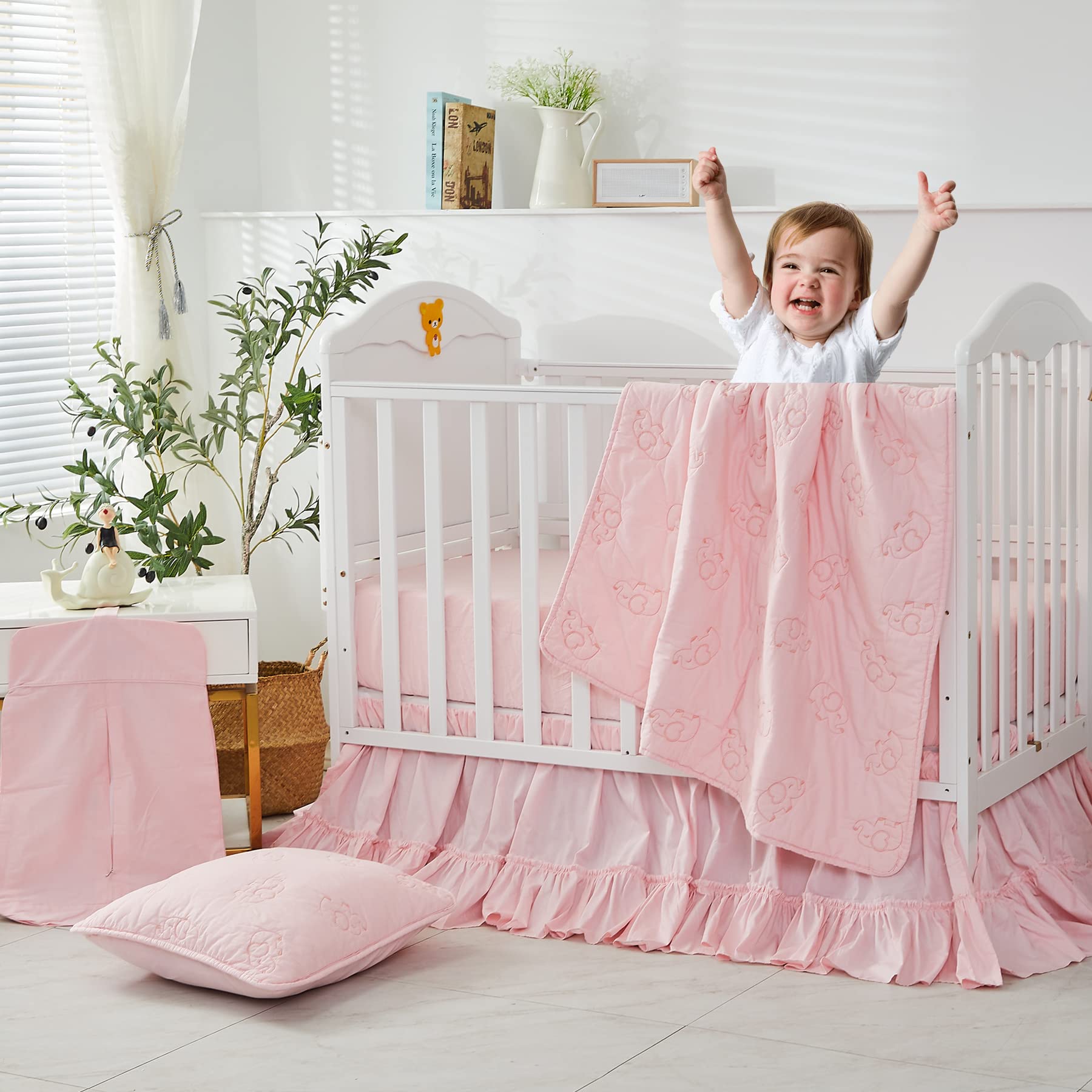 Brandream bedding pink cotton shot shows color harmony with crib setup.