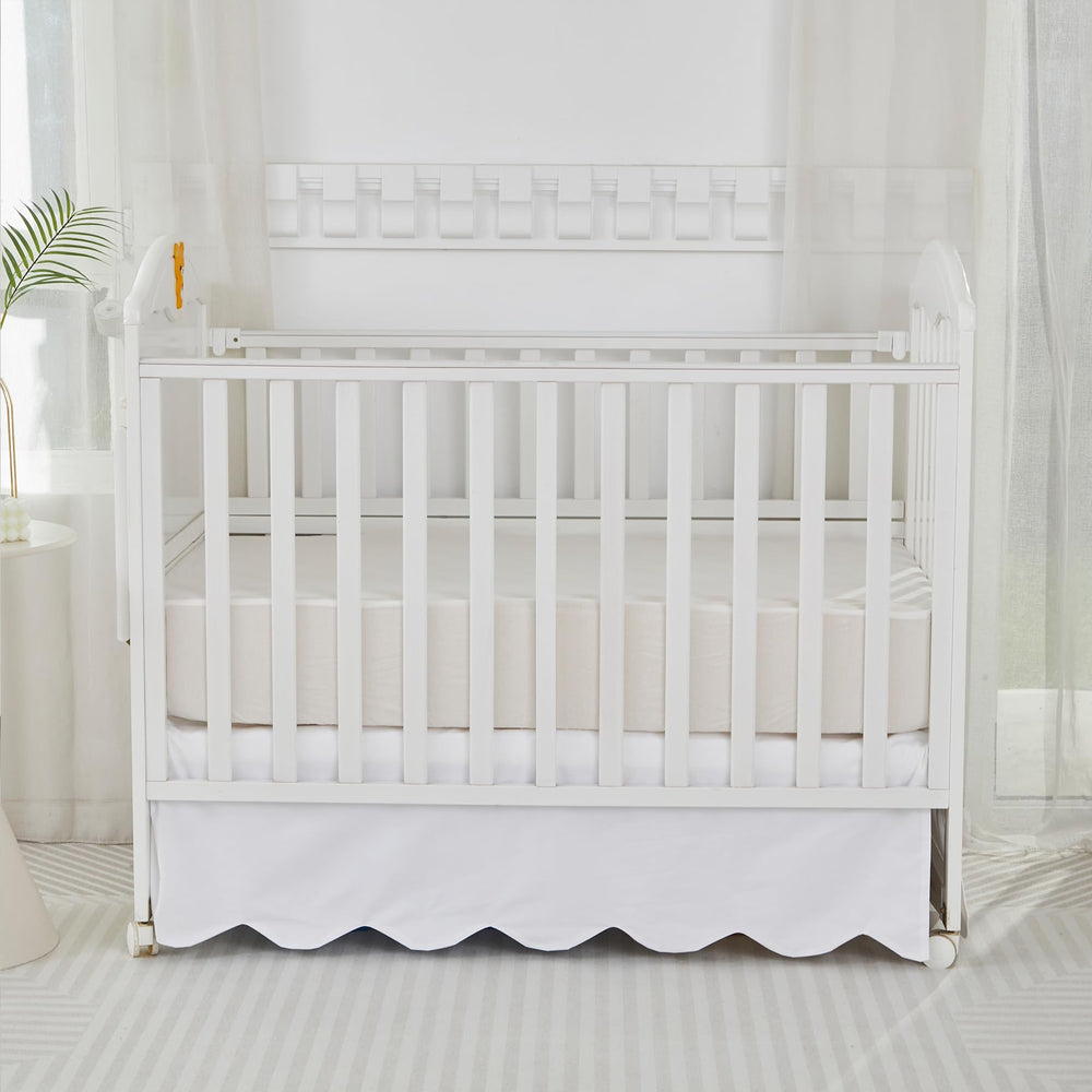 Brandream boho nursery with scallop edge skirt enhancing calm vibe.