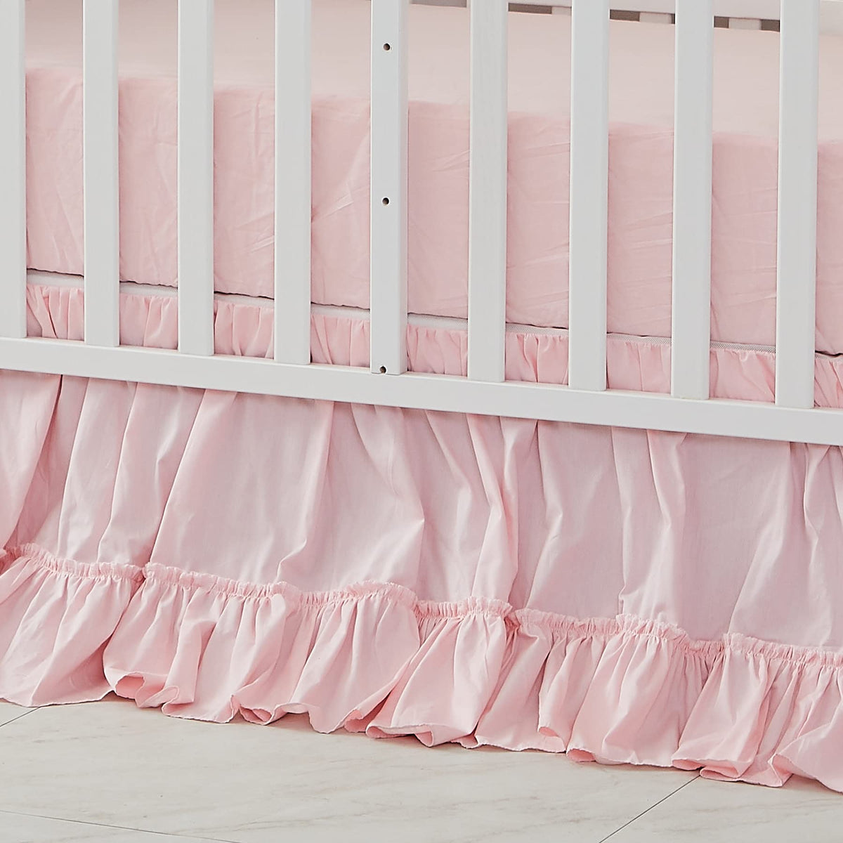 Brandream crib bedskirt pink boho closeup highlights soft cotton texture for cozy nursery décor.