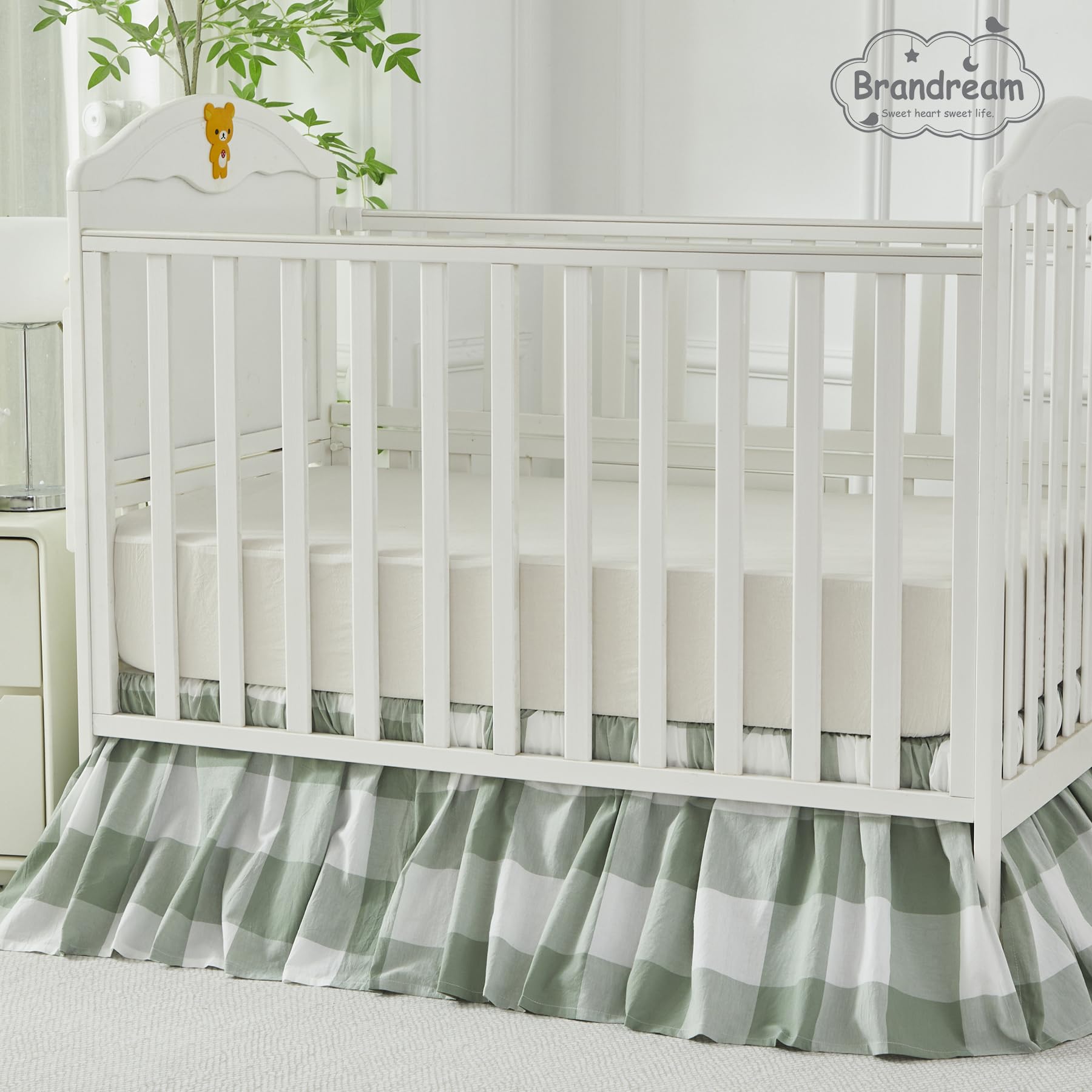 Brandream crib skirt paired with toddler bed transition showing lasting nursery use.