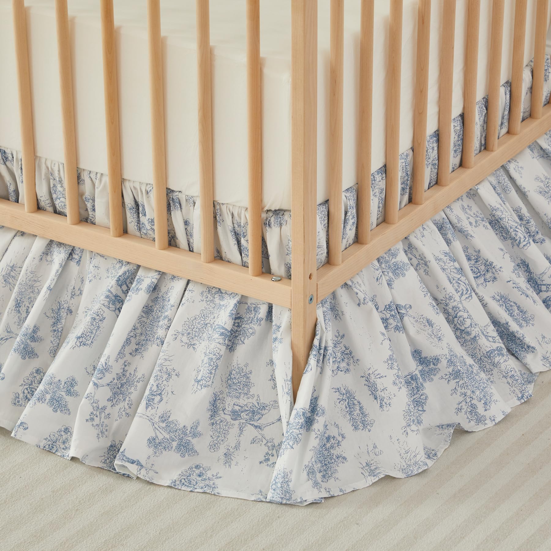 Brandream French Country Toile crib skirt in blue ruffles enhances nursery charm.