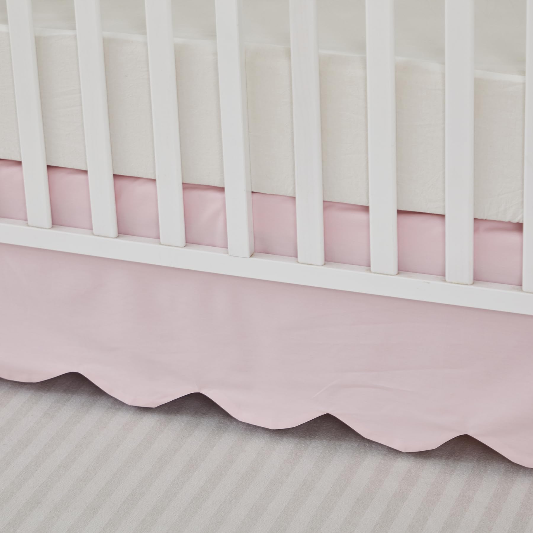 Brandream scallop edge crib skirt machine-washable fabric simplifies nursery care.