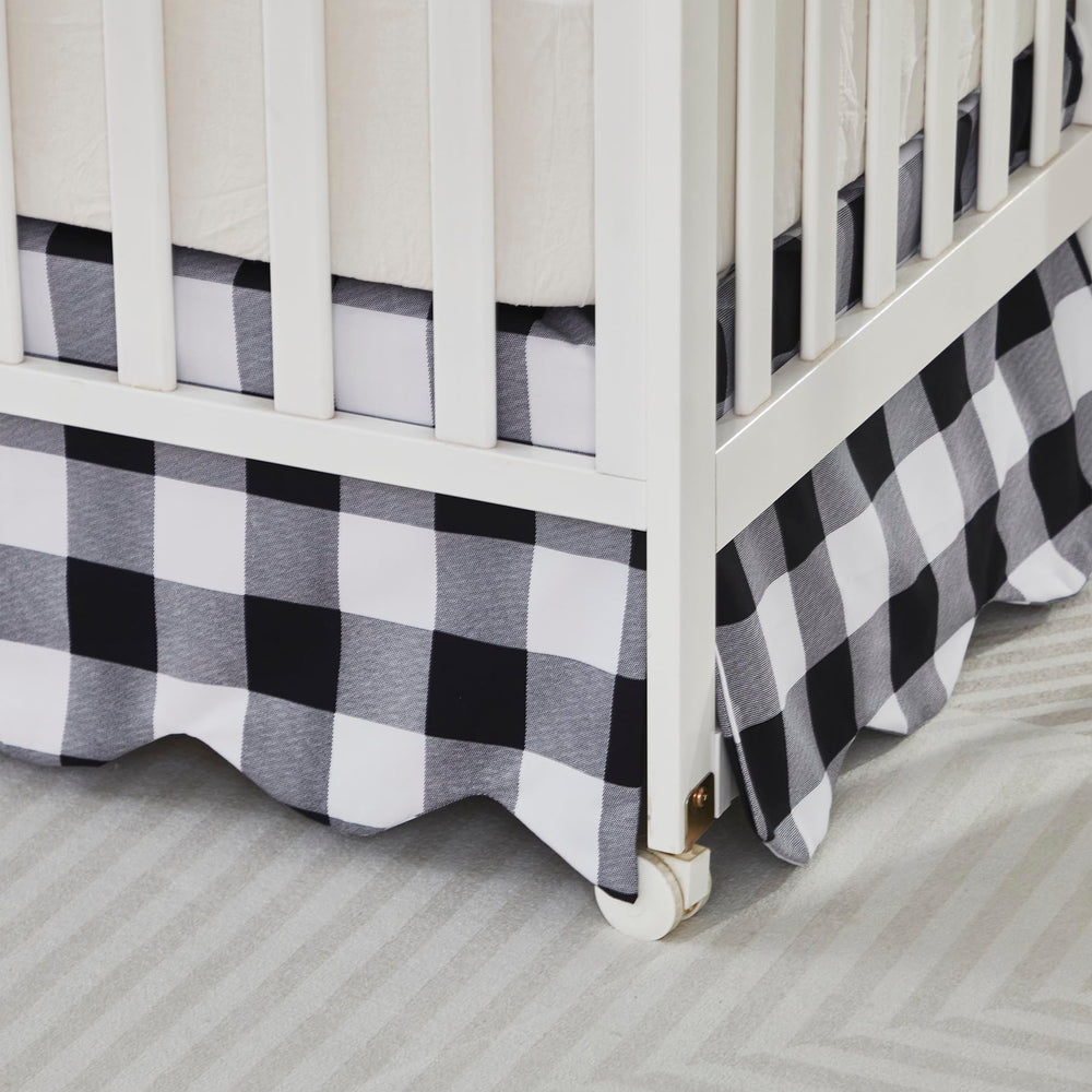Brandream Scallop Edge Crib Skirt in black-white gingham coordinates with modern nursery decor
