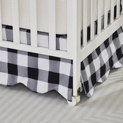 Brandream Scallop Edge Crib Skirt in black-white gingham coordinates with modern nursery decor
