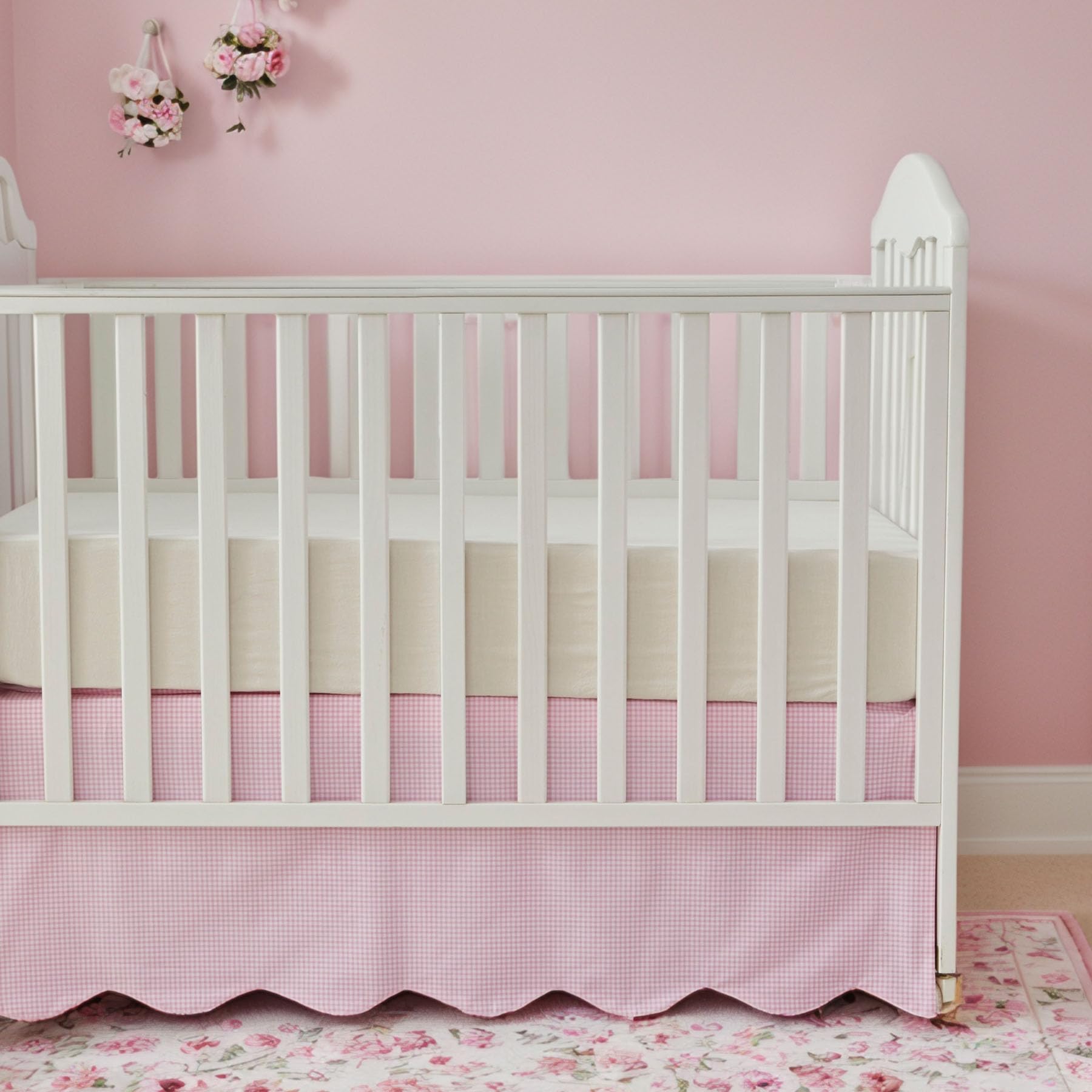Brandream scallop edge crib skirt close-up pink gingham adds nursery charm.
