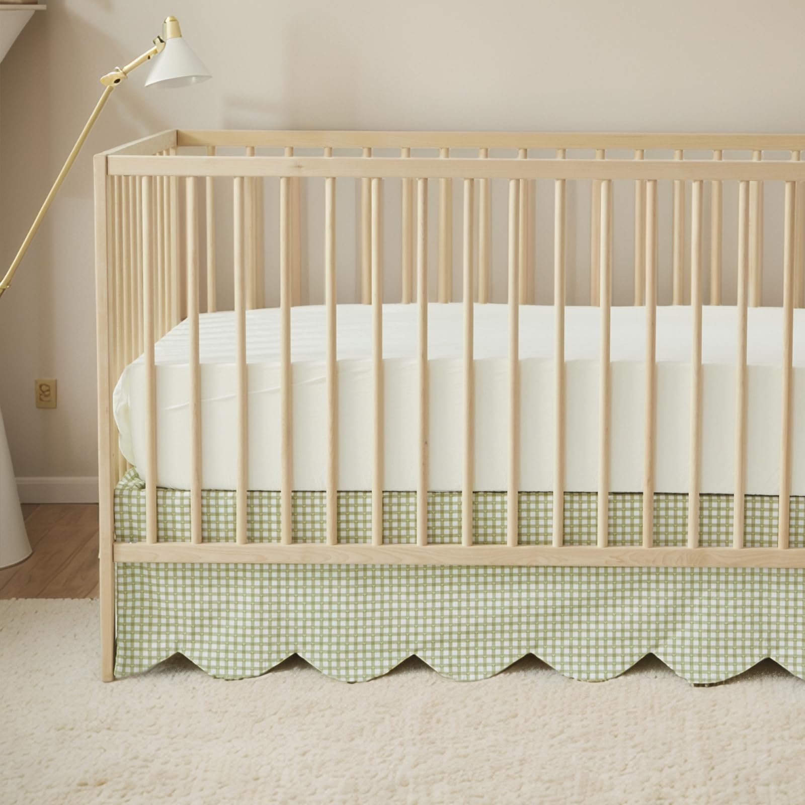 Brandream scallop edge crib skirt in cotton for a cozy nursery.