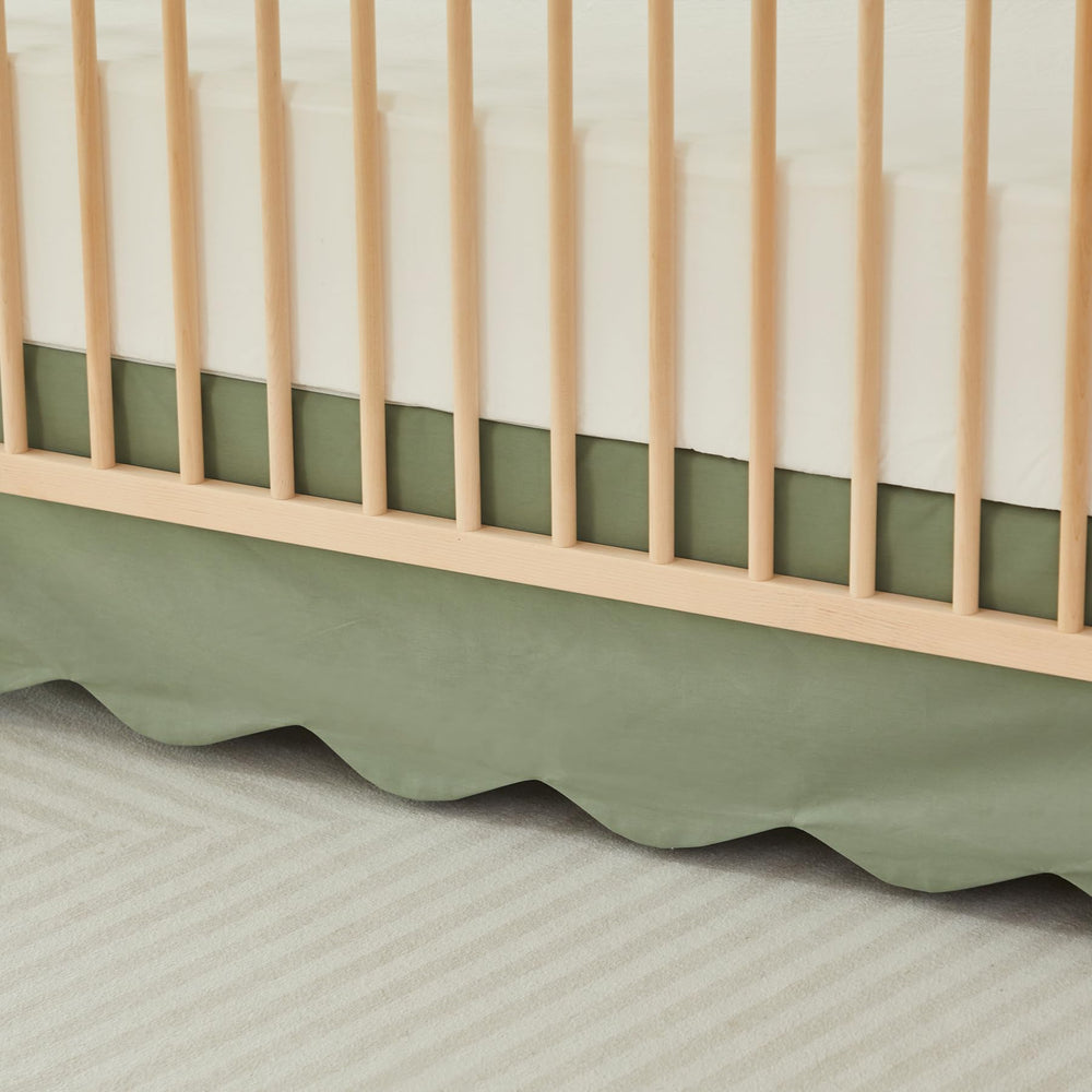 Brandream scallop edge crib skirt easy-care features in laundry setting