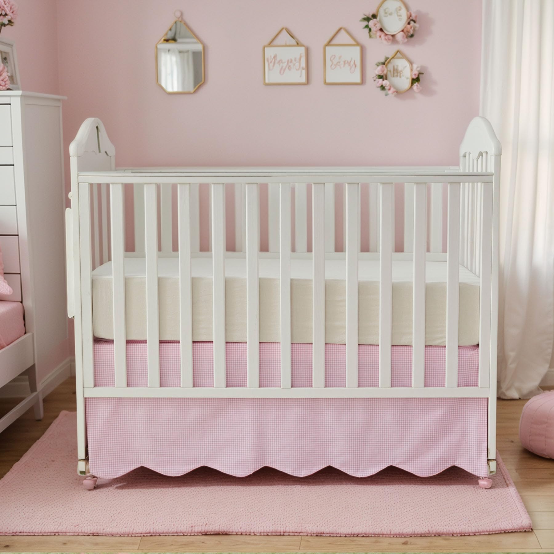 Brandream scallop edge crib skirt folded on crib showing fit.