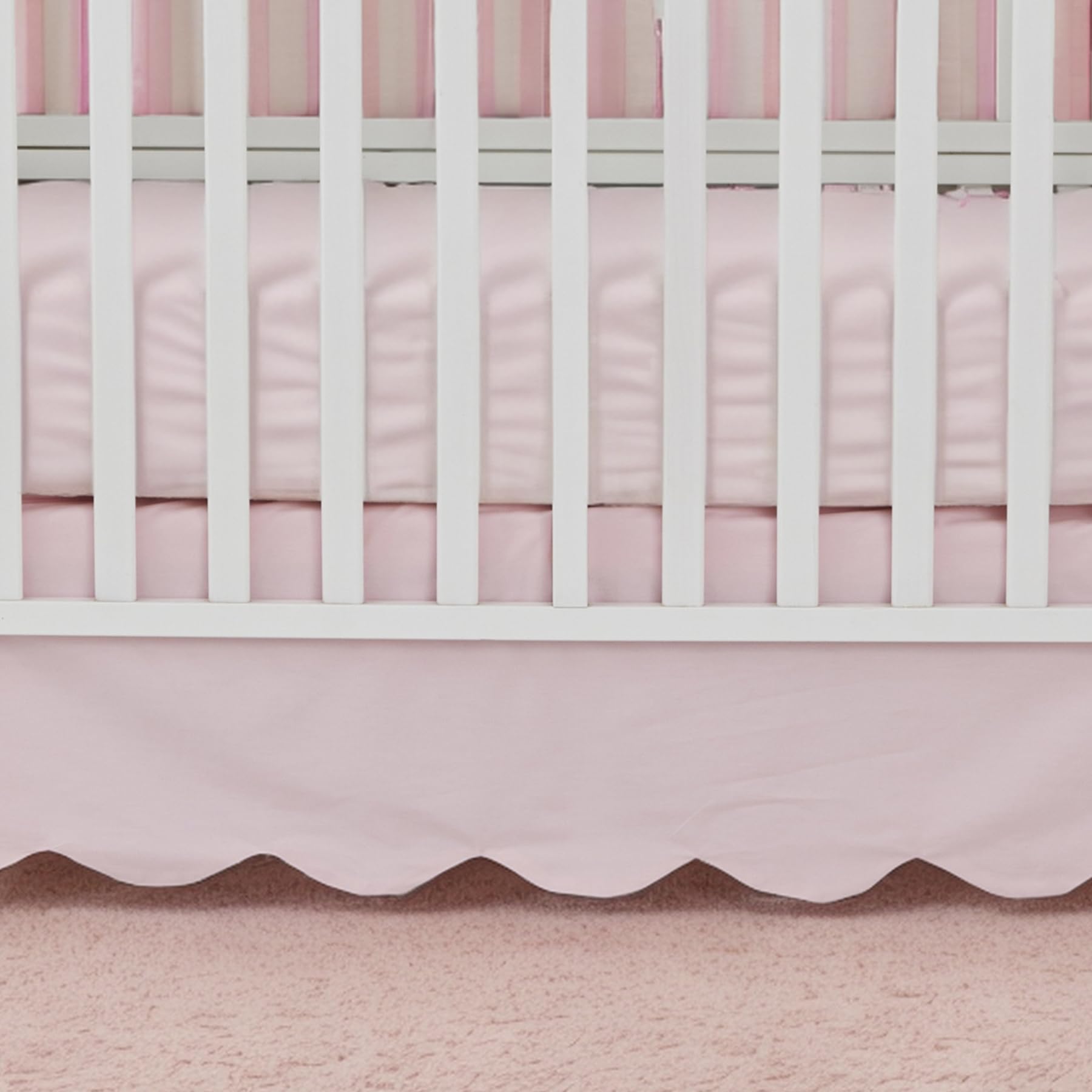 Brandream scallop edge crib skirt on a standard crib enhances Boho chic style.