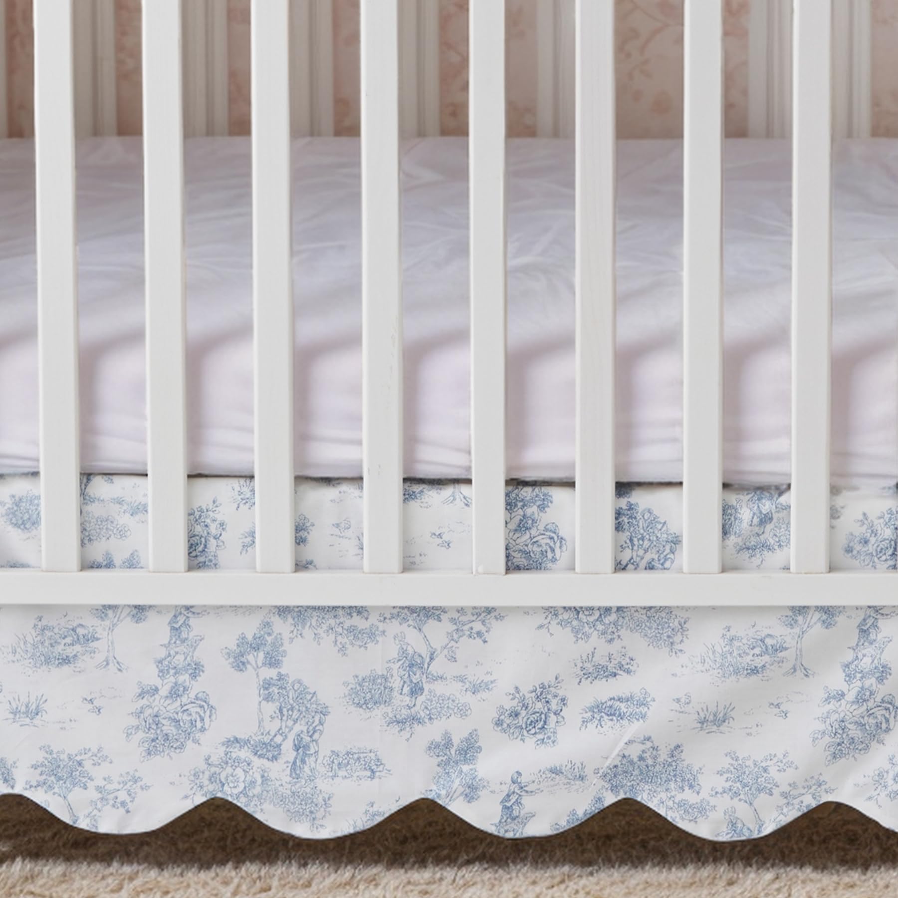 Brandream scallop edge crib skirt trim detail highlighting elegant nursery decor.