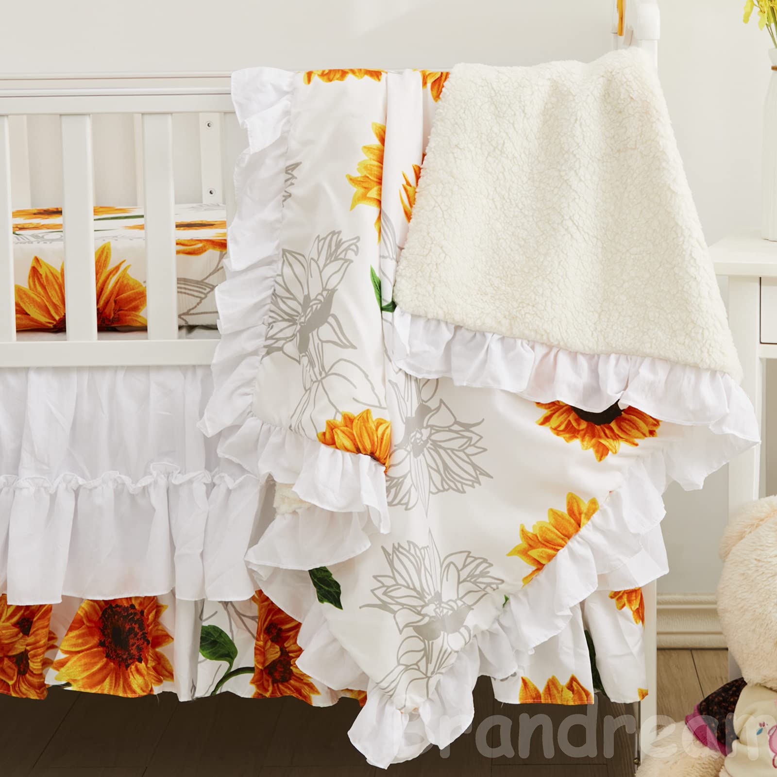 Brandream sunflower print design brightens any crib setting with a farmhouse vibe.