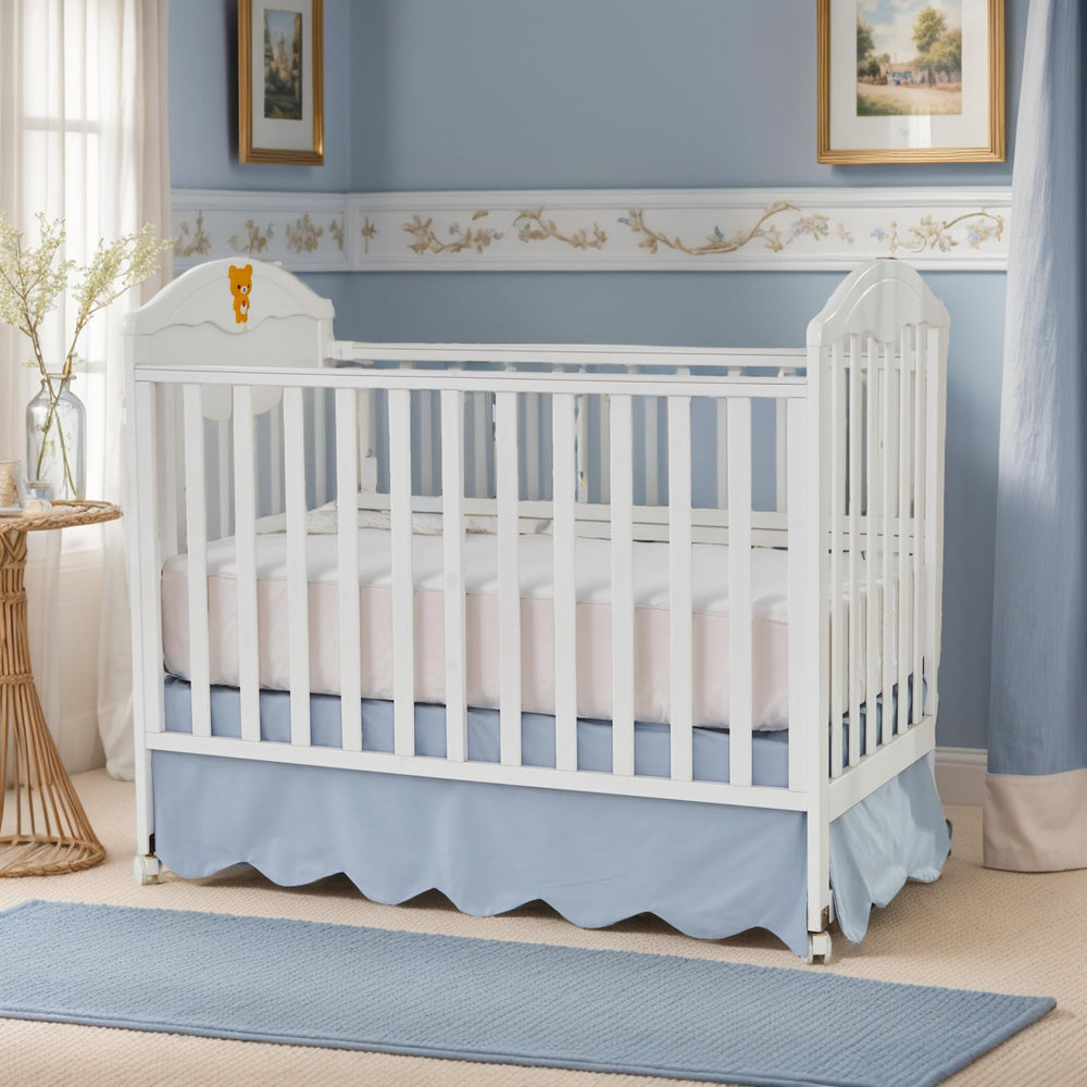 Brandream Wooden crib with Mist Blue skirt in a coordinated nursery style