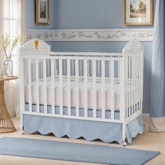 Brandream Wooden crib with Mist Blue skirt in a coordinated nursery style
