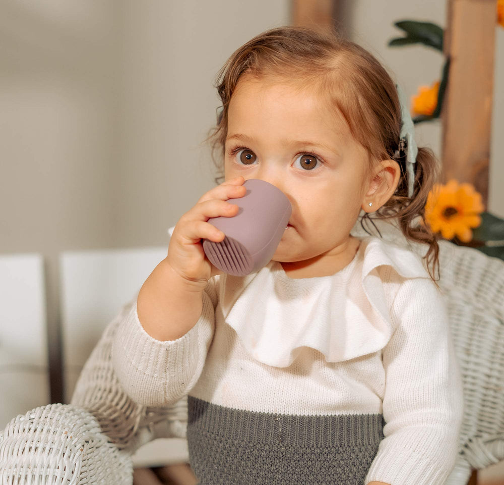 BraveJusticeKidsCo Teenie Tiny Cup in use aids motor skill development through practice