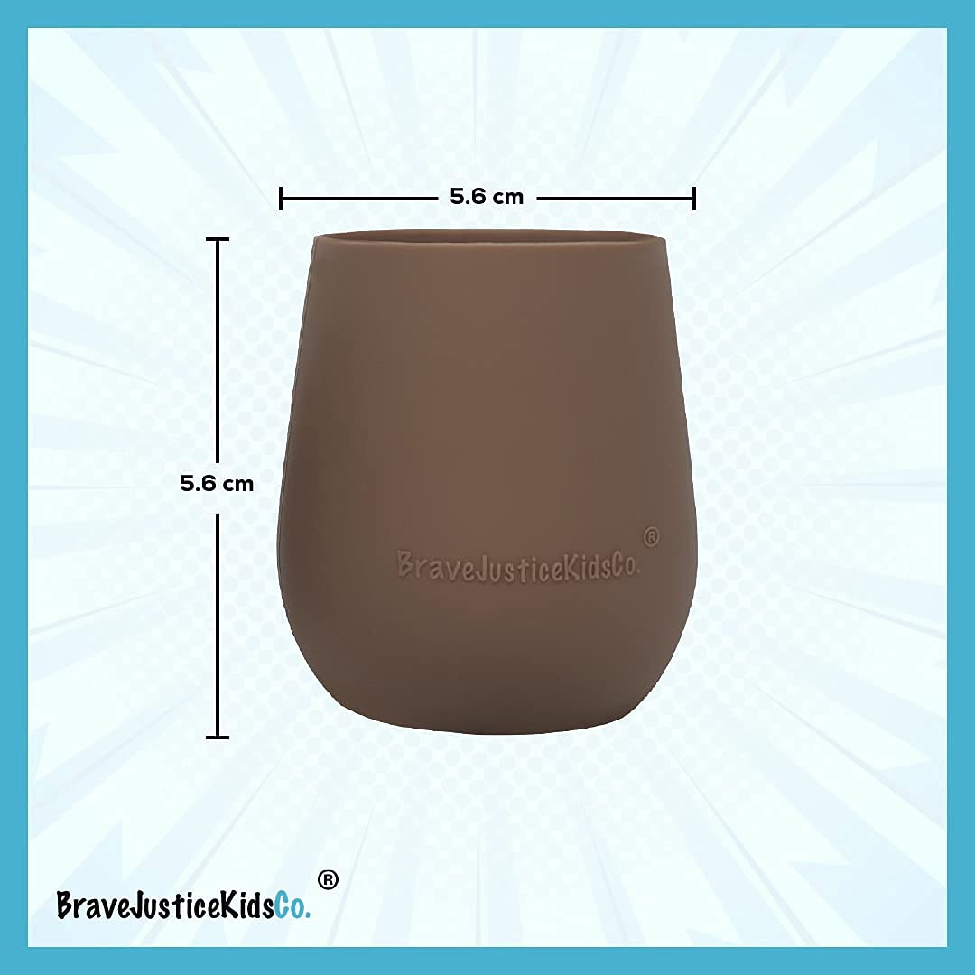 BraveJusticeKidsCo Teenie Tiny Cup on table during mealtime supports independent sipping