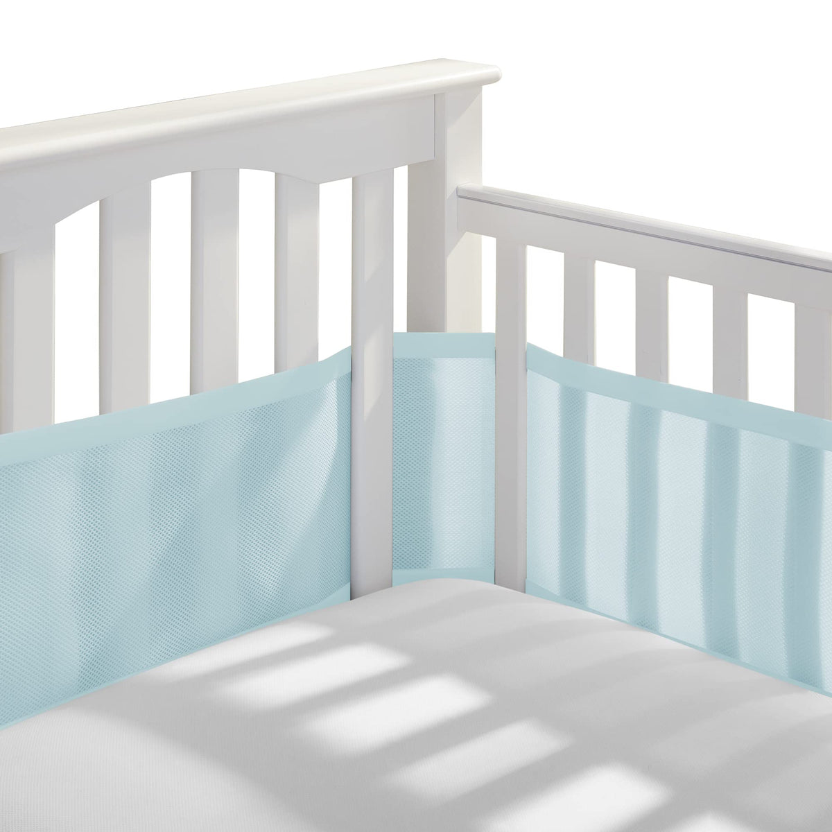 BreathableBaby breathable mesh liner for full-size crib showing steady airflow around the crib edges.
