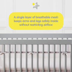 BreathableBaby crib liner full-size 52x28 shows quick hook-and-loop installation for a secure fit.