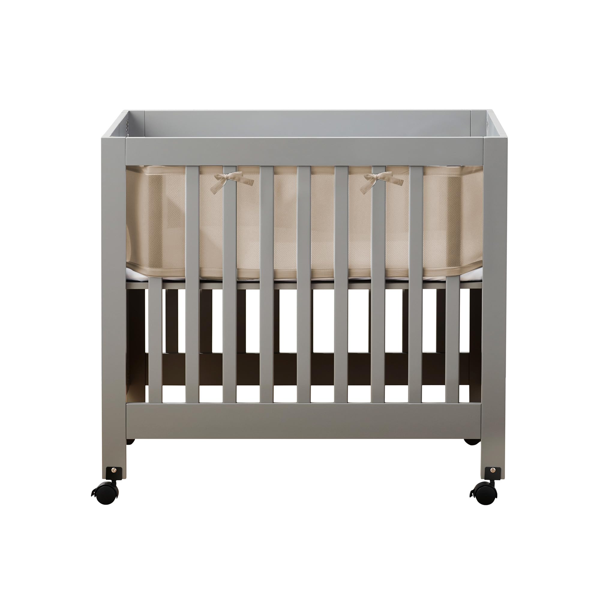 BreathableBaby mini-crib mesh liner shell pink cover shows four-sided protection.