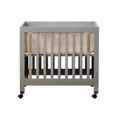 BreathableBaby mini-crib mesh liner shell pink cover shows four-sided protection.