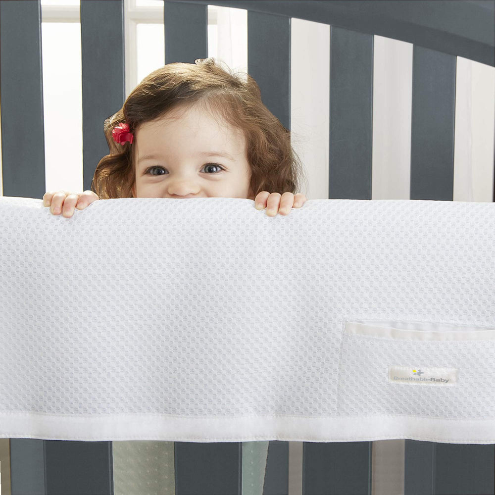 BreathableBaby easy-install hook-and-loop straps demonstrate secure setup.