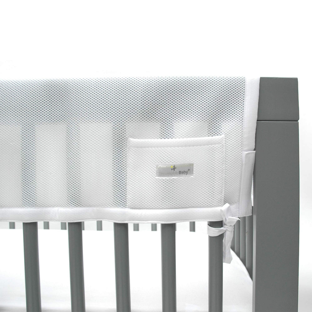 BreathableBaby railguard front pocket keeps pacifiers and teethers within reach.