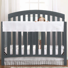 BreathableBaby railguard long panel cover on crib rail for teething protection.