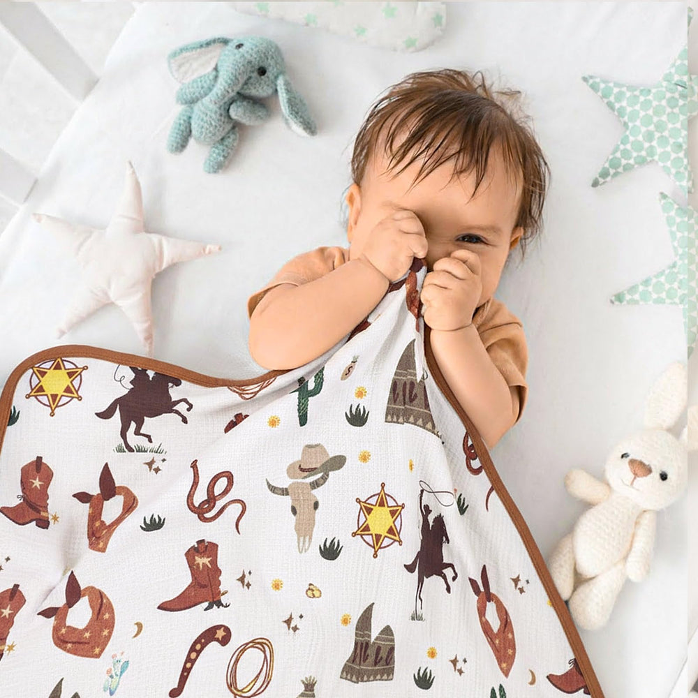 Breling baby nursery decor blanket showcases stylish white-and-yellow cowboy motif