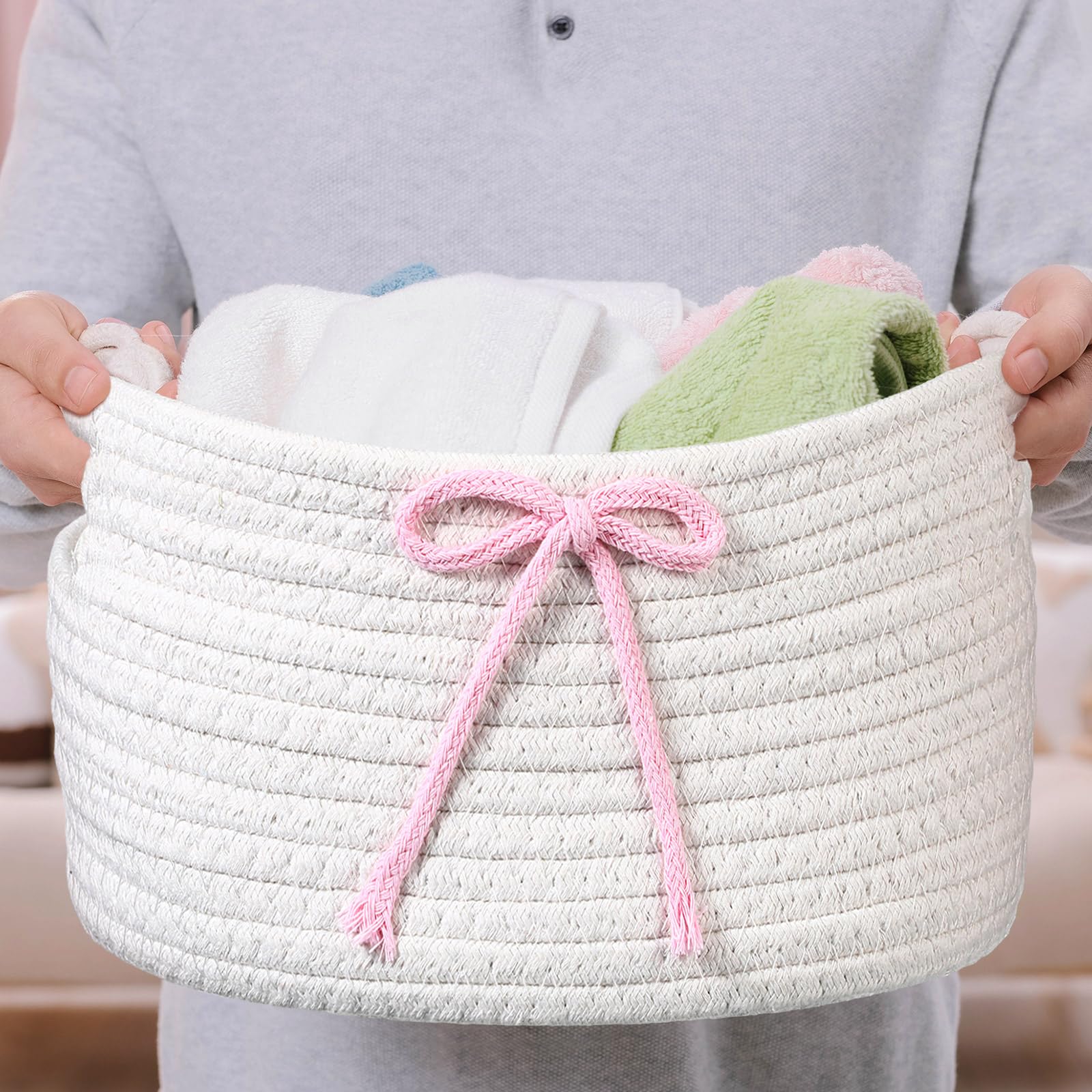 Breling Coquette bow nursery organization basket complements playful decor