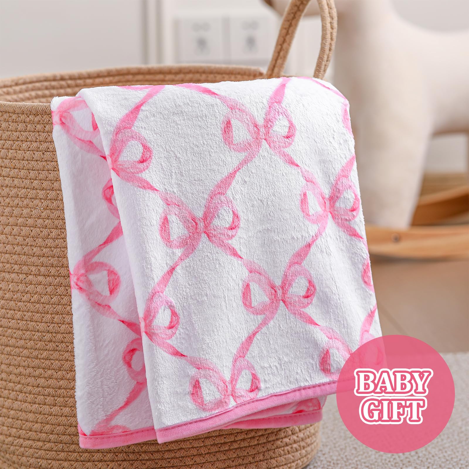 Breling pink bow blanket closeup shows soft flannel texture and bow detail