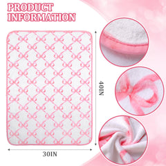 Breling pink bow blanket in crib offers gentle warmth for baby sleep