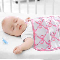 Breling pink bow blanket in stroller demonstrates portability for outings
