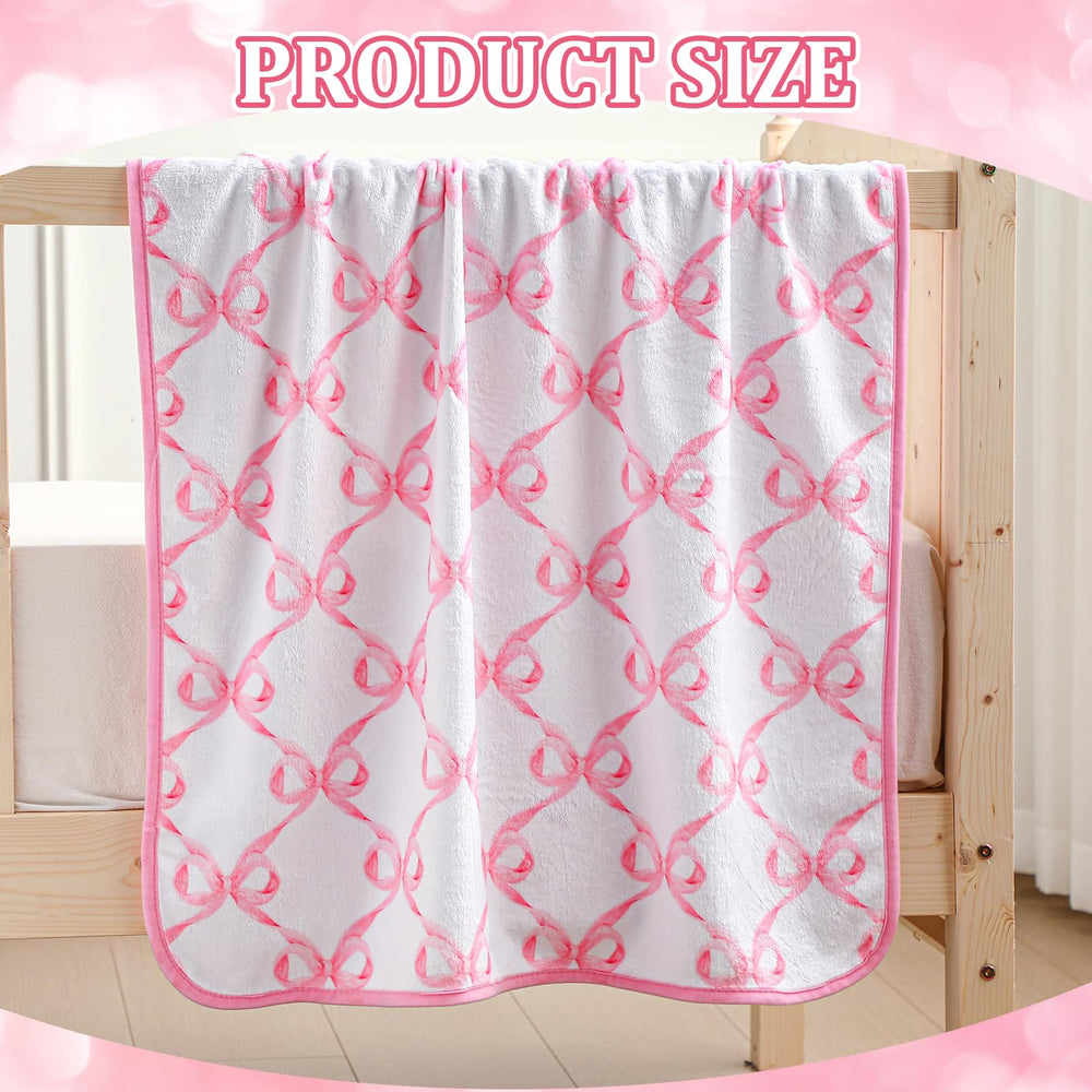 Breling pink bow blanket swaddle in use providing calm, comfy daytime nap