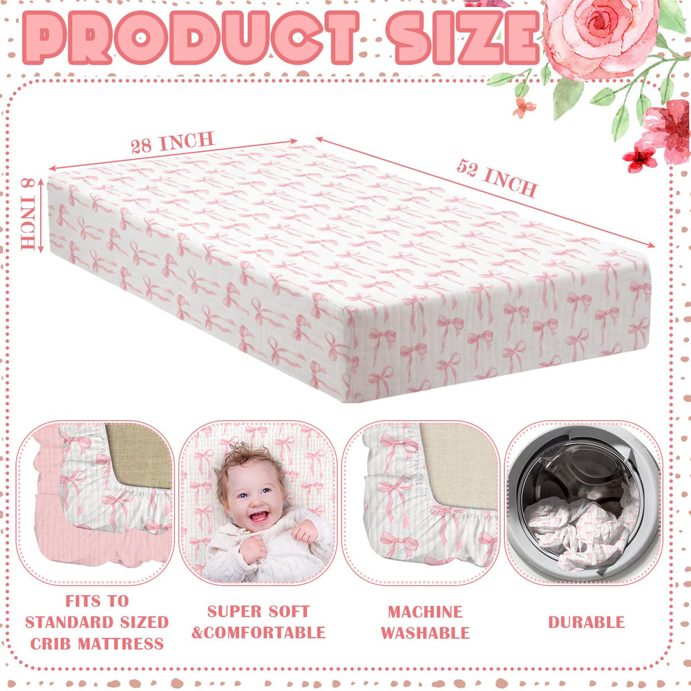 Breling pink bow crib sheet two-piece set laid flat for display of fit