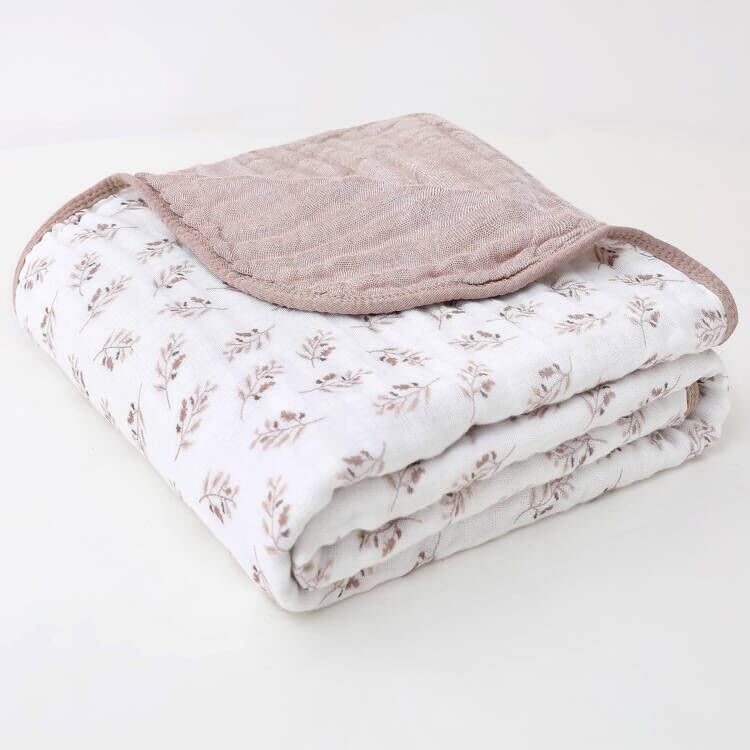 Brnabiou Ultra Soft Muslin Blanket Coffee close-up weave demonstrates breathable fabric for swaddling.
