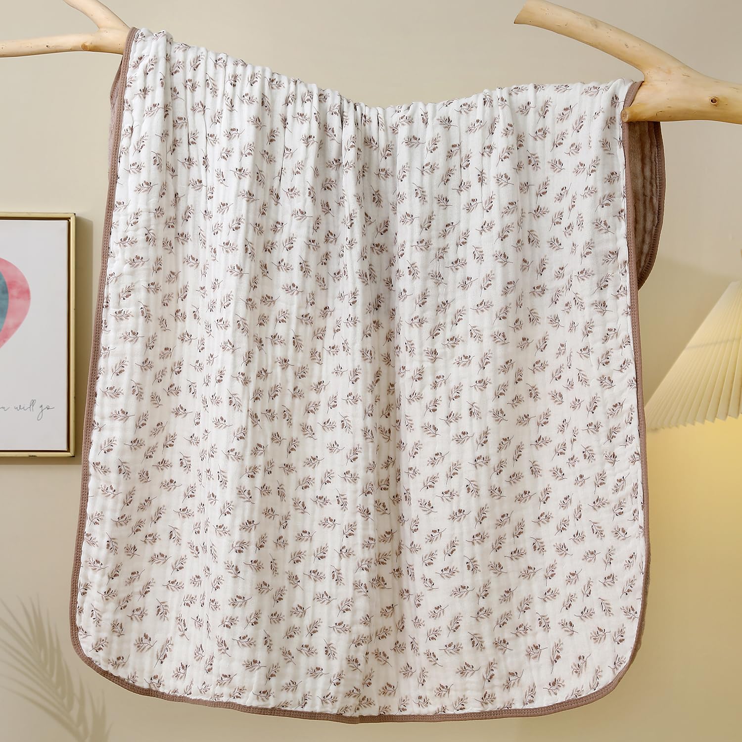 Brnabiou blanket Coffee swaddling scene shows cozy, skin-friendly fabric for newborn comfort.
