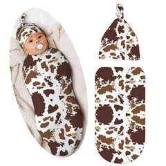 Broiteid cow-print swaddle bag helps newborns feel snug and soothed for sleep.