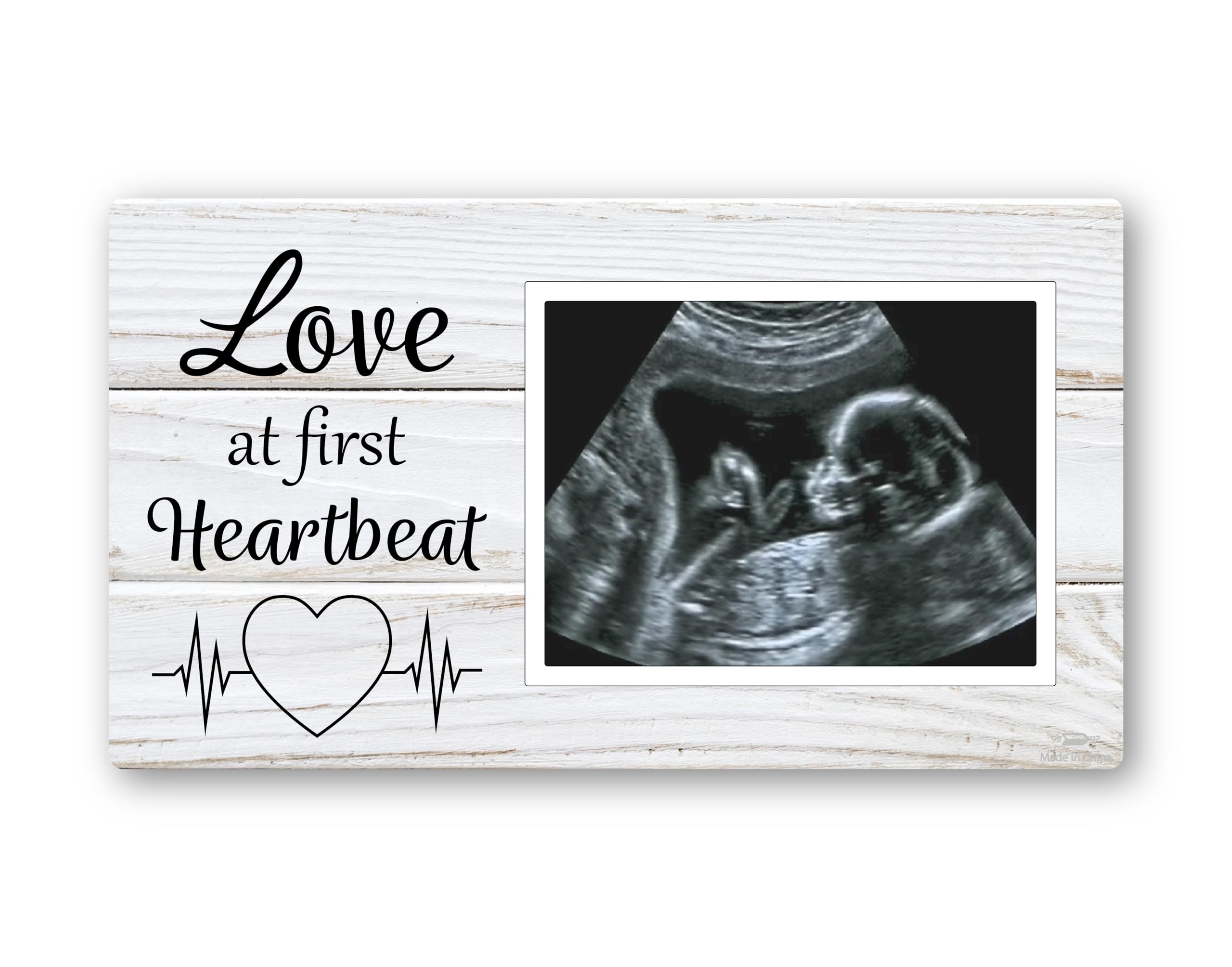 Brothers Bench Love at First Heartbeat frame on fridge magnet closeup keepsake display.
