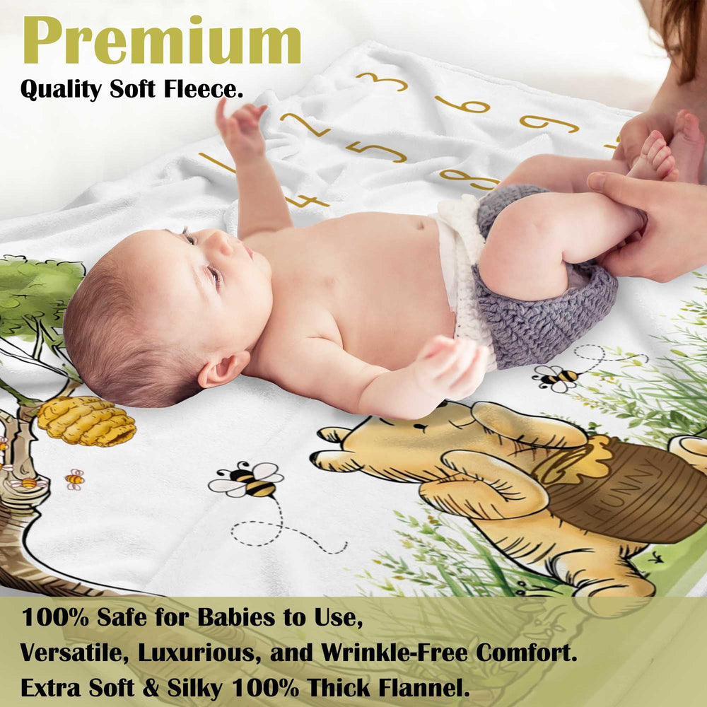 Bttwkco Classic Winnie milestone blanket soft fabric closeup highlighting silk-touch feel for baby comfort.