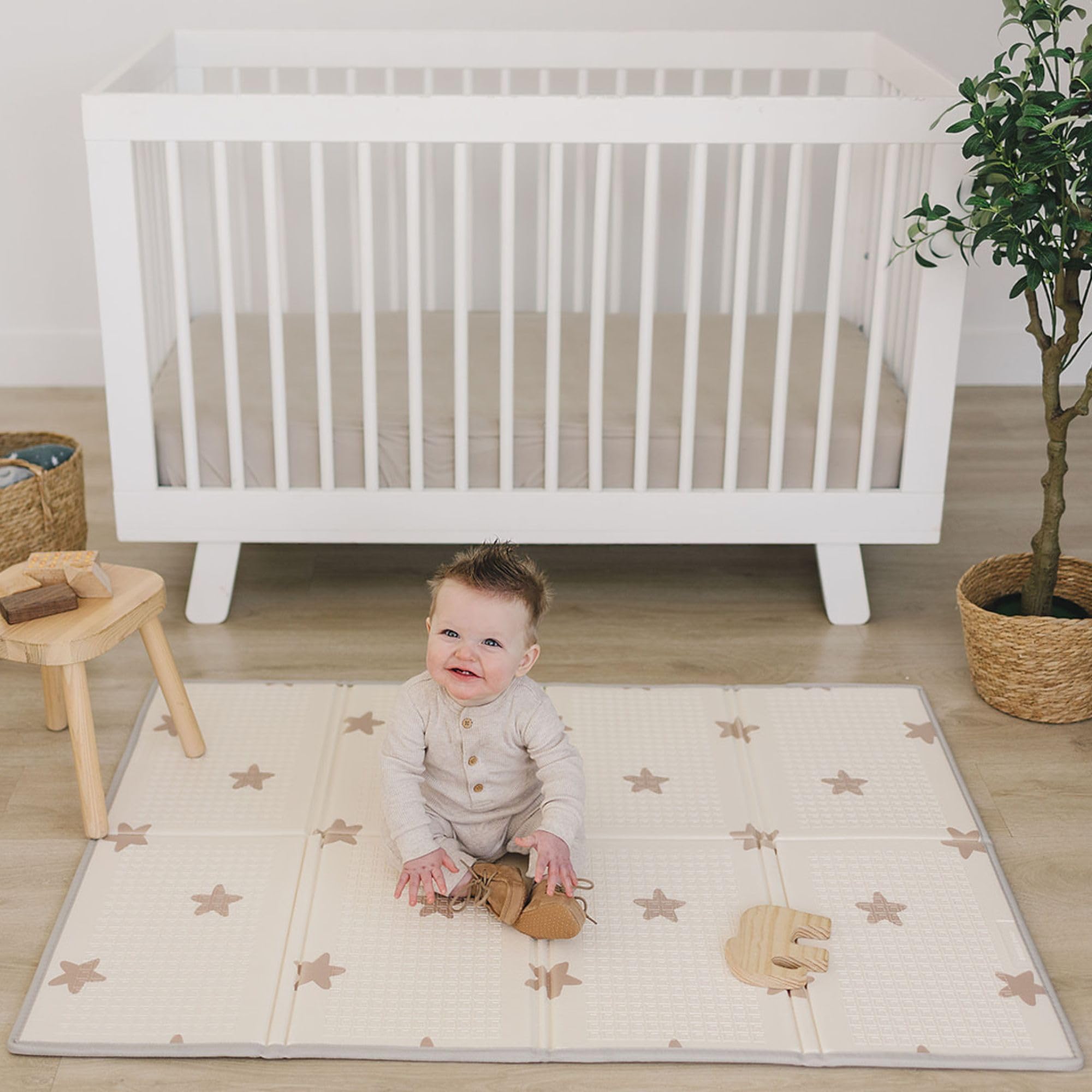 Bubba Bear baby play mat folded-compact demonstrates portable storage for trips.