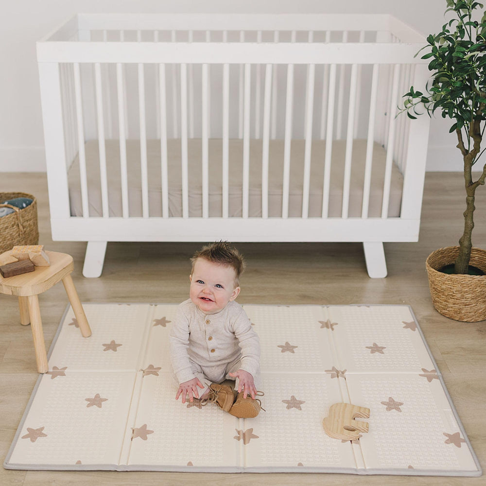 Bubba Bear baby play mat folded-compact demonstrates portable storage for trips.
