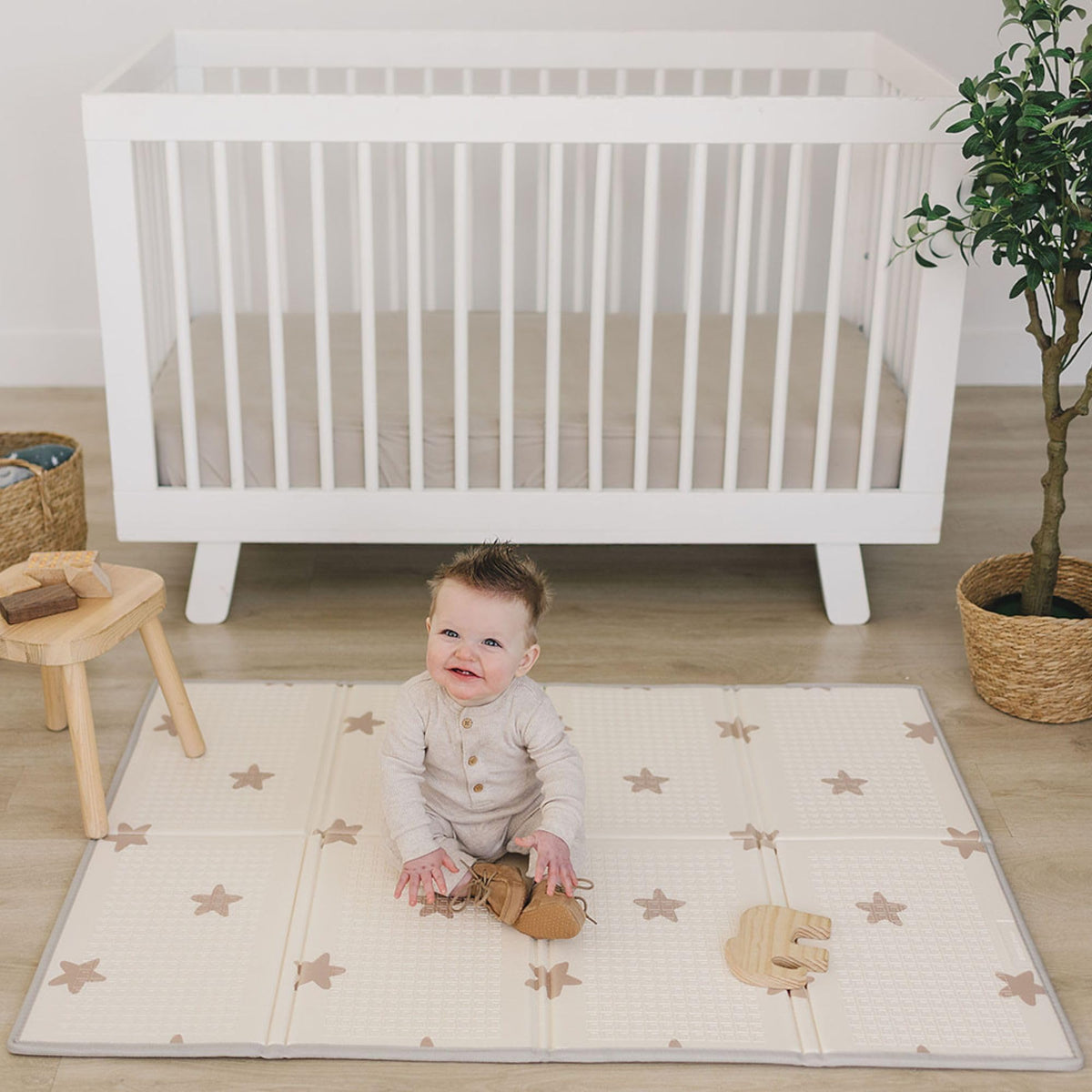 Bubba Bear baby play mat folded-compact demonstrates portable storage for trips.