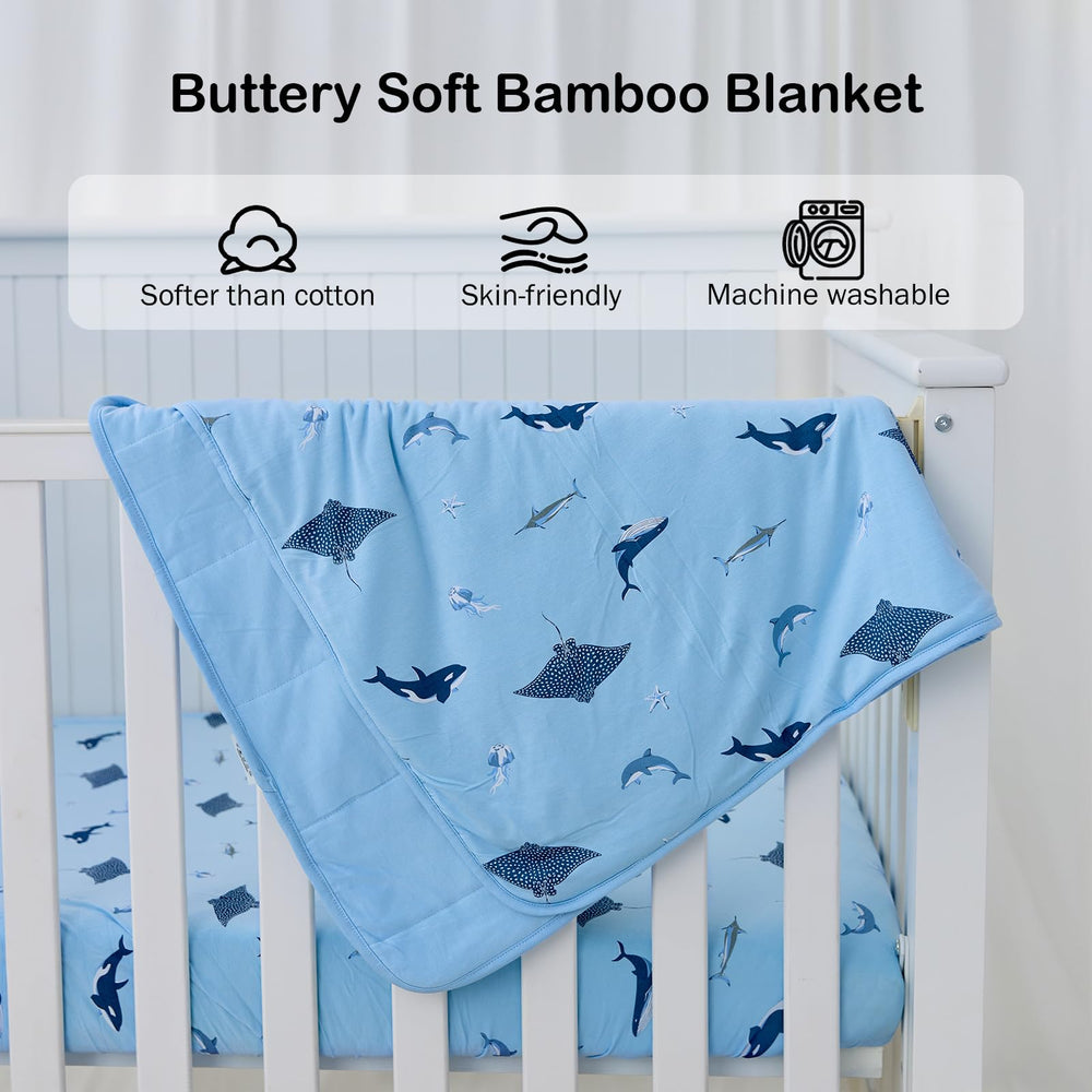 BubblePanda bamboo blanket with shark pattern in nursery demonstrates breathable comfort.