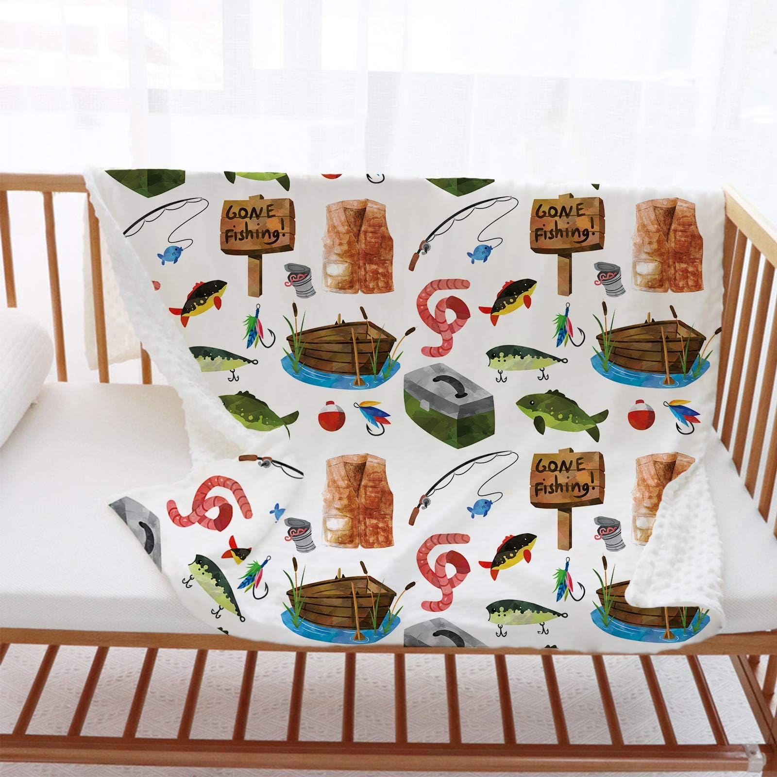 Buerhanerry Gone Fishing blanket in crib for snug secure naps