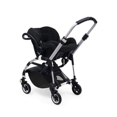 Bugaboo Bee car seat adapter in use with Maxi-Cosi for smooth car-to-stroller transitions.